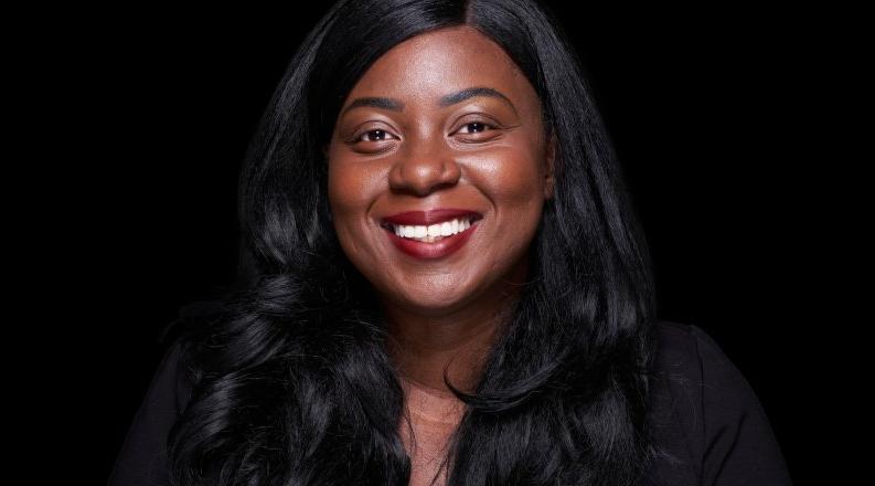 Headshot of a woman.