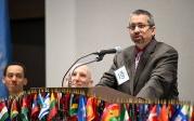 Odaid H. Jafri speaks from a podium.