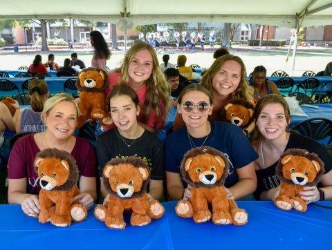 Students with stuffed animals