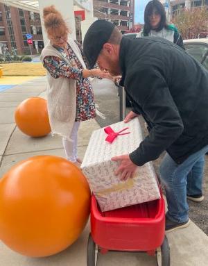 Photo of toys being delivered to Children's Hospital of the King's Daughters. 