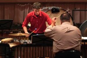 David Walker, foreground, directs the Old Dominion University Percussion Ensemble, including his son Michael Walker.